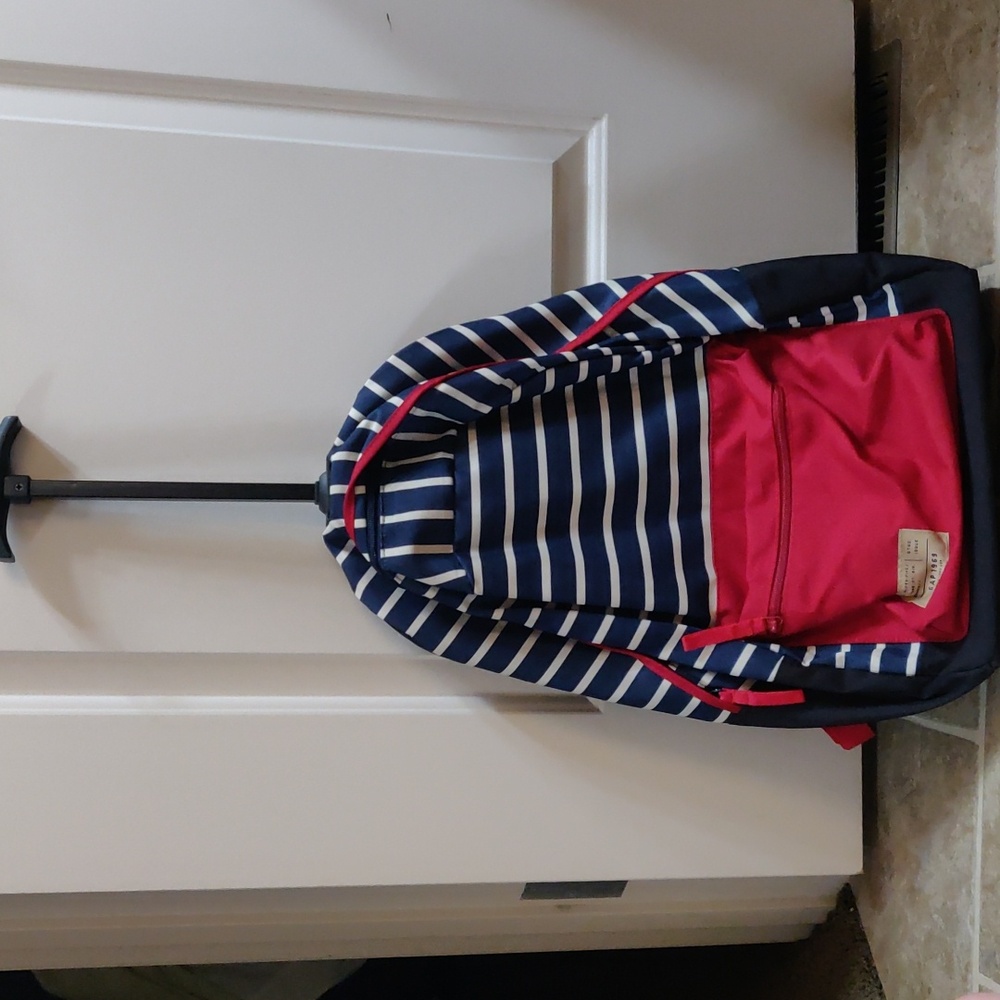 The Gap luggage/backpack with wheel - new without tag